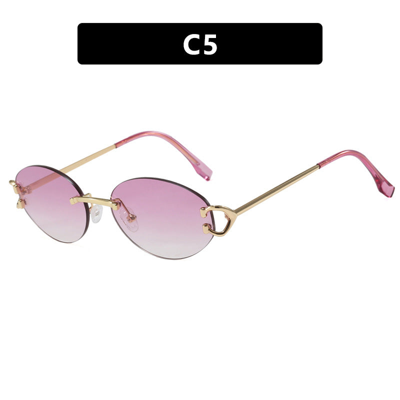 Dame elegant ovalformet solbrille med moderne metalramme Skanto