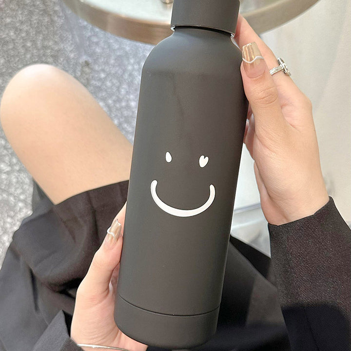 Damen Isolierflasche med innovativt smilmotiv Skanto