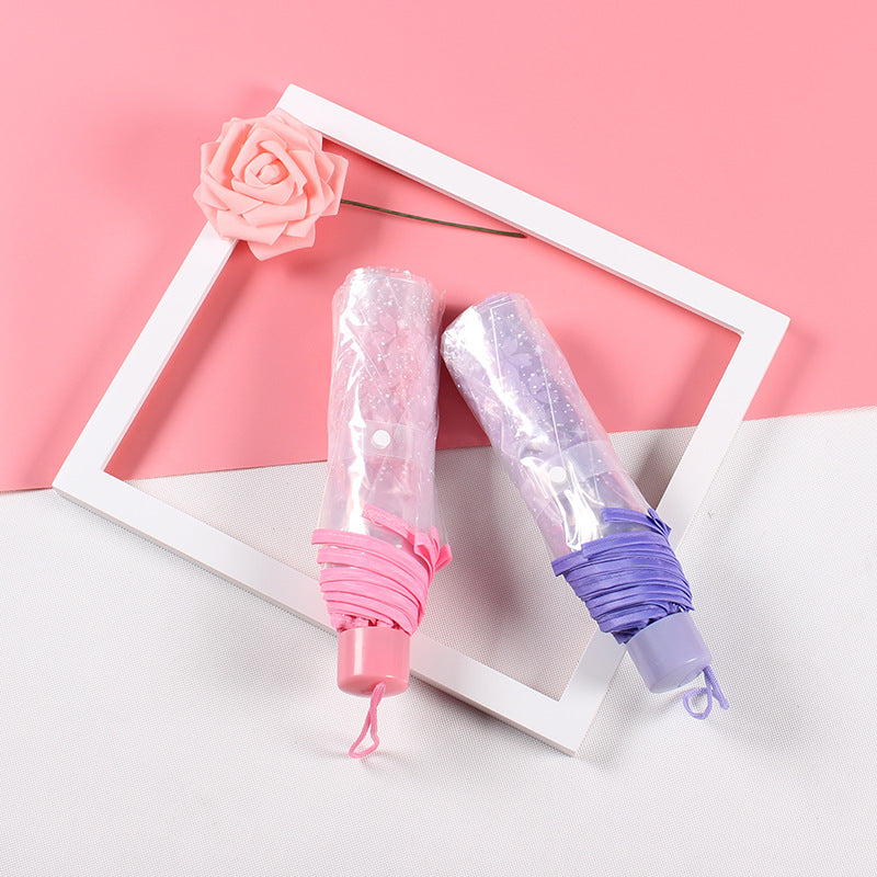 Damer elegant og bærbar paraply med blomsterdesign Skanto