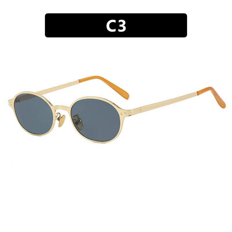 Dame rund brille med filigran metallramme og behagelige nesepads Skanto