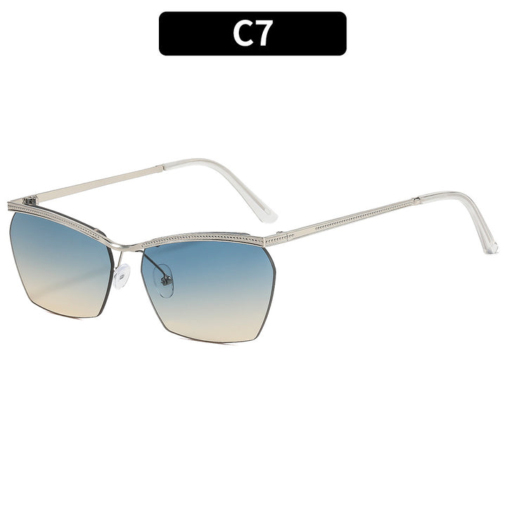 Dame moterik solbrille med filigran ramme og myk fargegradient Skanto