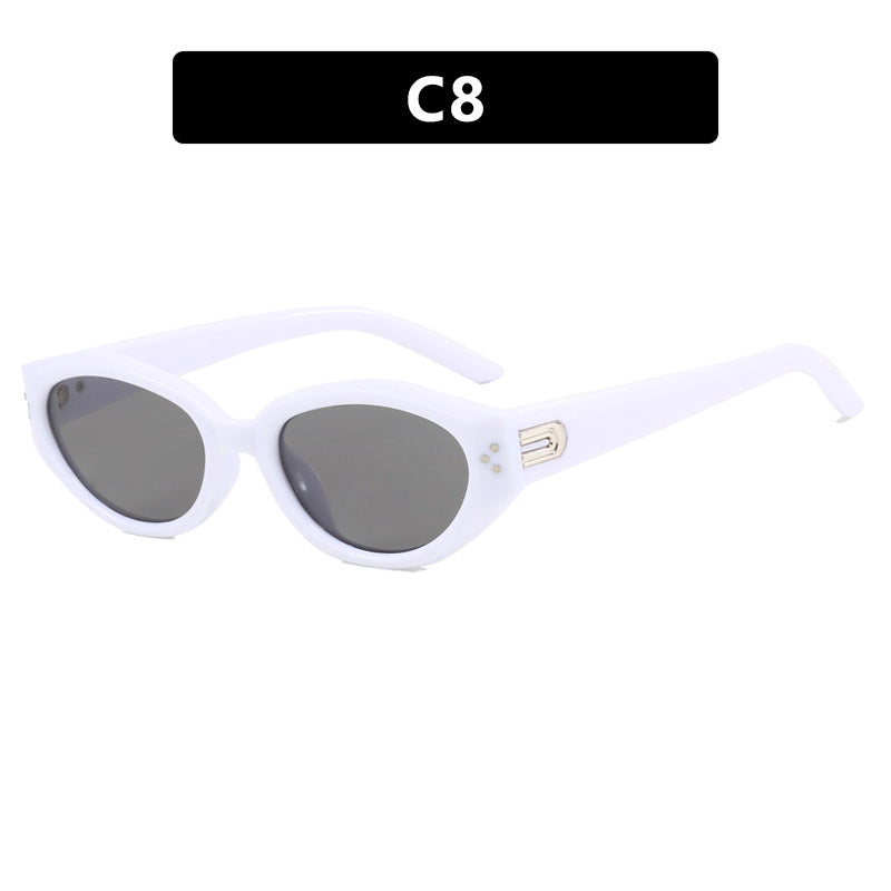 Dame Cat-Eye solbrille med aksentuerte transparente ramme og UV-beskyttelse Skanto