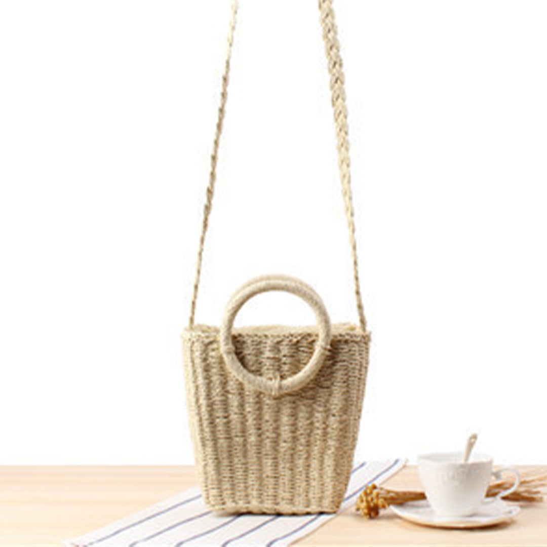 Woven natural material handbag with round handle Skanto