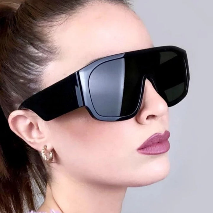 Dame Motebar Oversized-solbriller med unik design Skanto