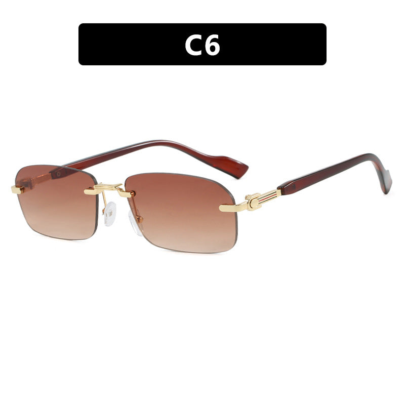 Dame solbrille med elegant metallramme og stilige tre detaljer Skanto