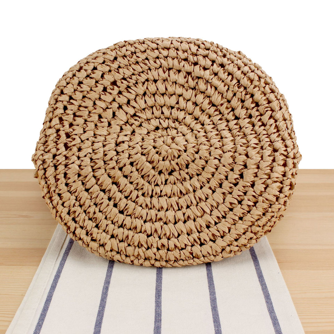 Handbag made of hand-woven natural material with decorative clasp Skanto
