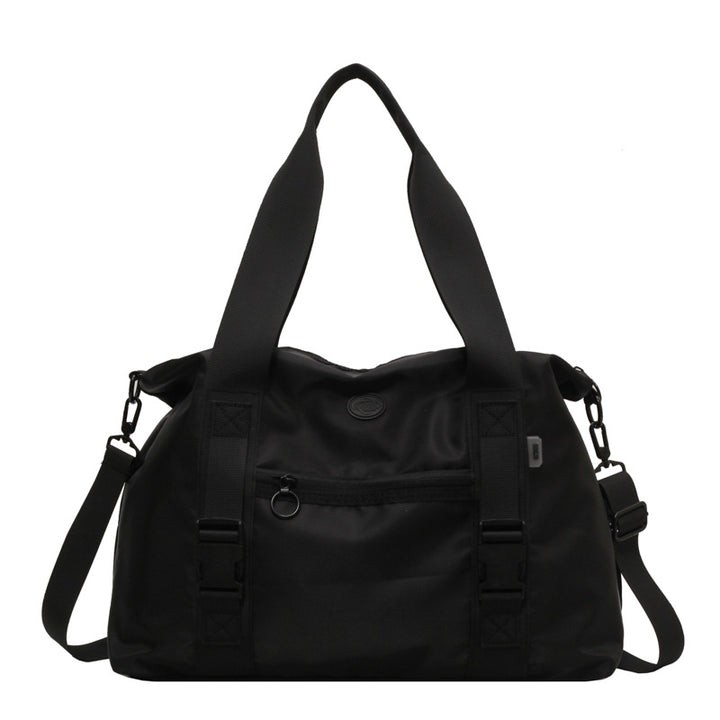 Romslig sport duffel bag med ergonomiske bærehåndtak og vannavvisende materiale Skanto