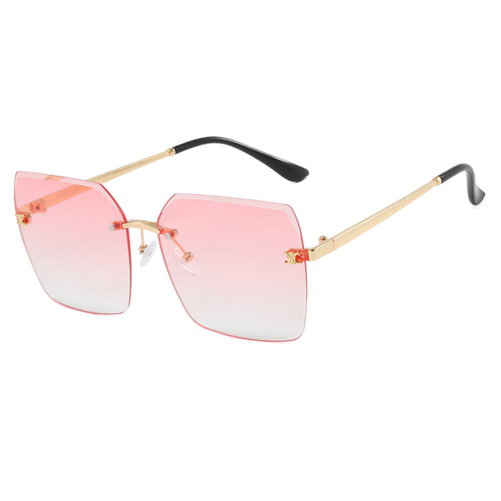 Dame firkantet solbrille i moderne design med filigran metallramme Skanto