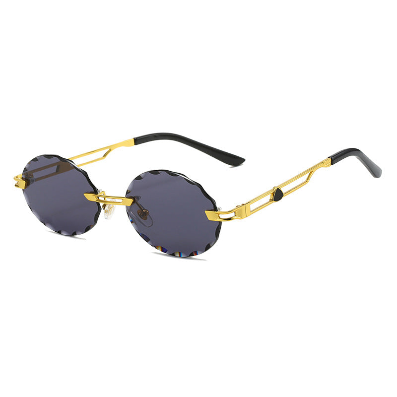 Dame rund solbrille med unikt bølgedesign og høykvalitets metallramme Skanto