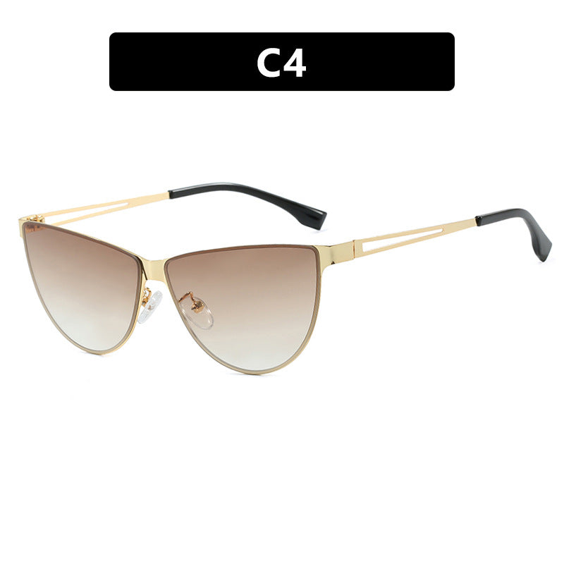 Dame Cat-Eye solbriller med stilfull metallramme og beskyttende UV-filter Skanto