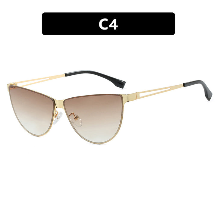 Dame Cat-Eye solbriller med stilfull metallramme og beskyttende UV-filter Skanto