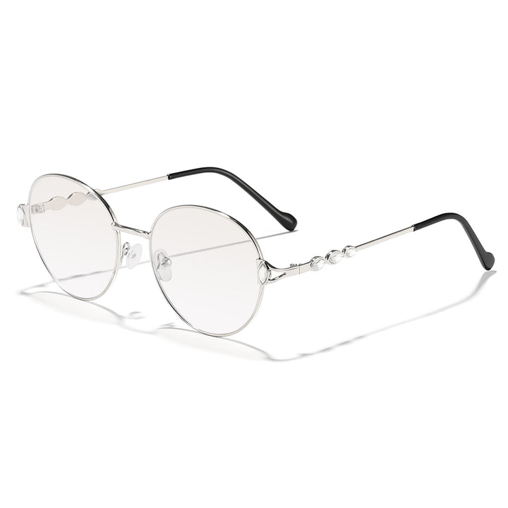Dame rund solbrille med elegant metallramme og speilvendte glass Skanto