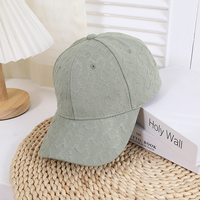 Kvinnens teksturerte motebaseballcaps Skanto