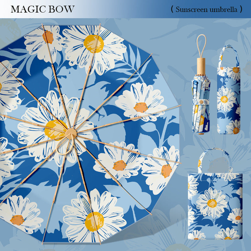 Dame kreativ solbeskyttelsesparaply med kunstnerisk blomsterdesign Skanto