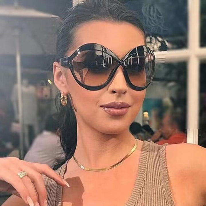 Dame ekstravagant formet solbrille Skanto