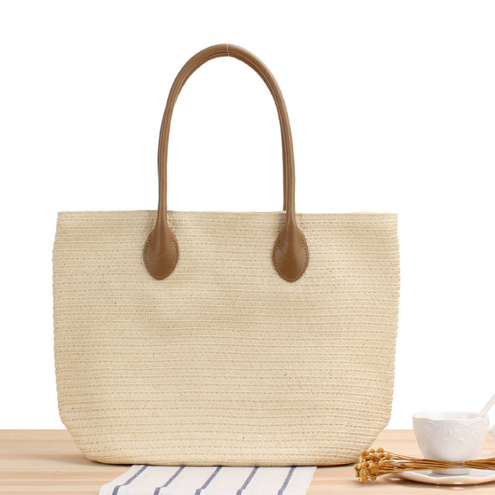 Spacious straw shopper with leather handles Skanto