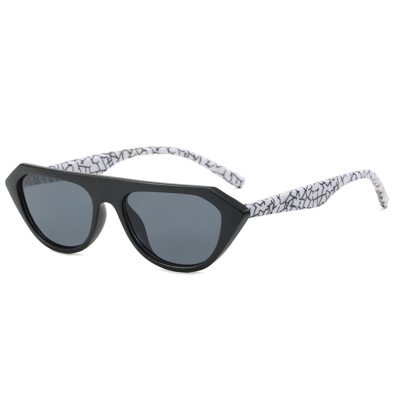Dame moteriktig asymmetrisk solbrille Skanto