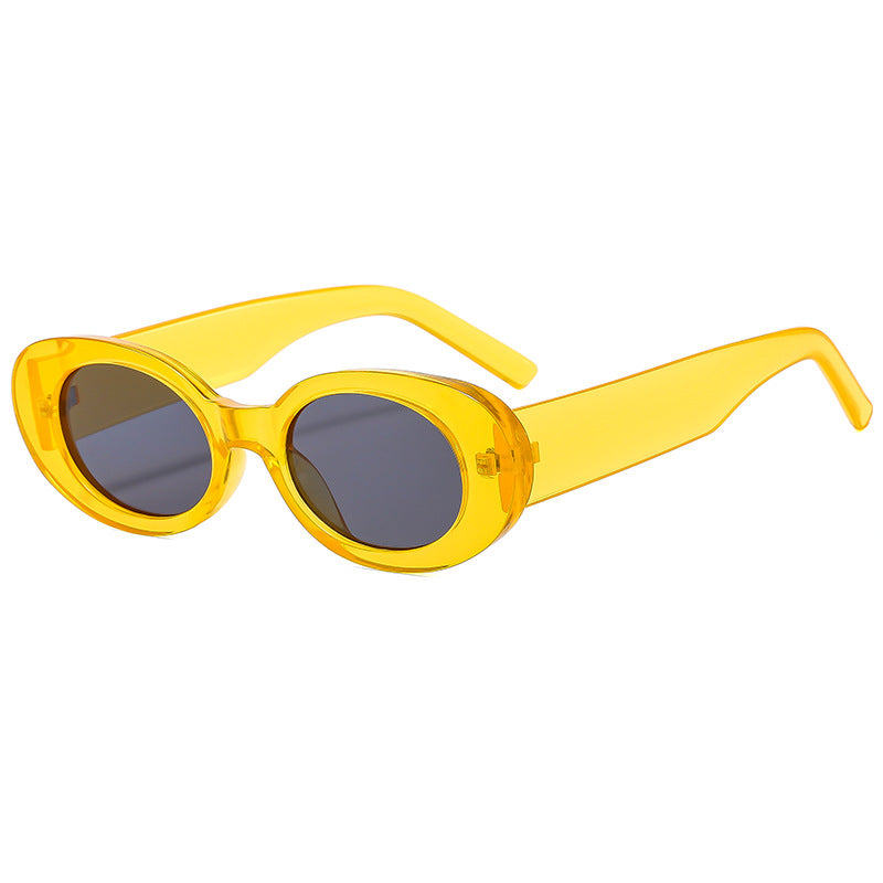 Dame modische solbrille med unik oval ramme Skanto