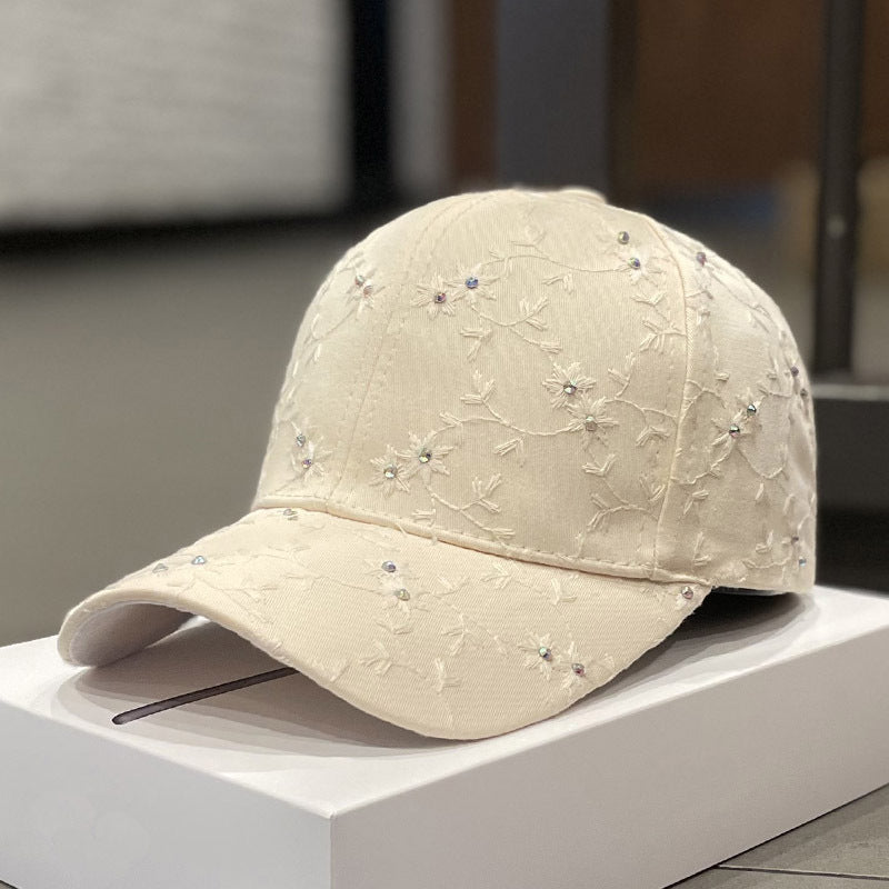 Kvinnebrodert baseball cap med rhinestones-detalj Skanto