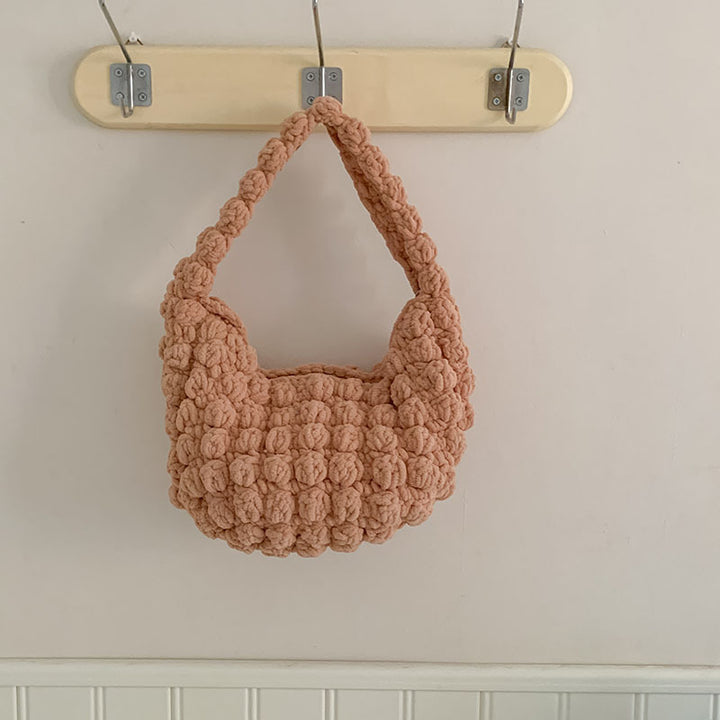 Håndlaget veske med strukturert design Skanto