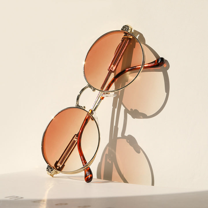 Dame rund Vintage-solbrille med eksklusiv metallramme Skanto