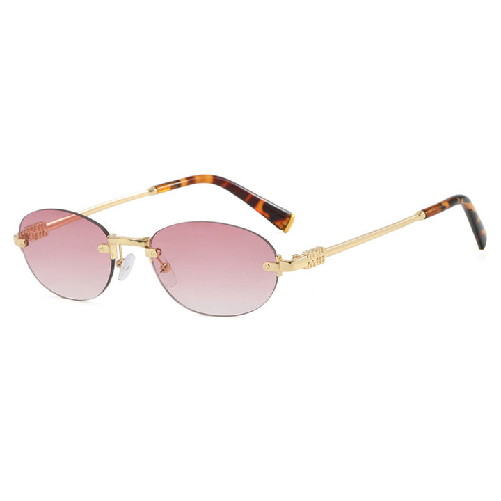 Dame moterimessig solbrille med oval ramme og elegante aksenter Skanto