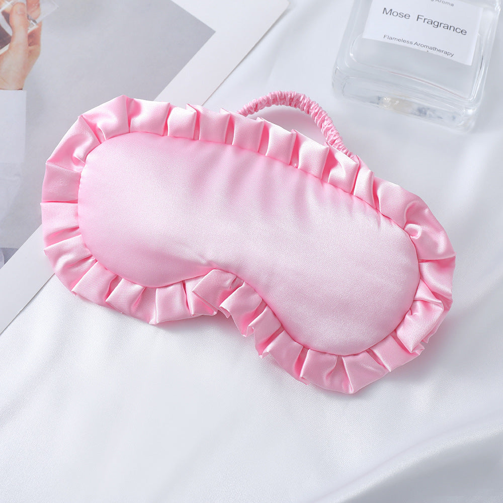 Dame nan satin-glinsende øyemaske med ergonomisk kontur, volangkant og myk polstring Skanto
