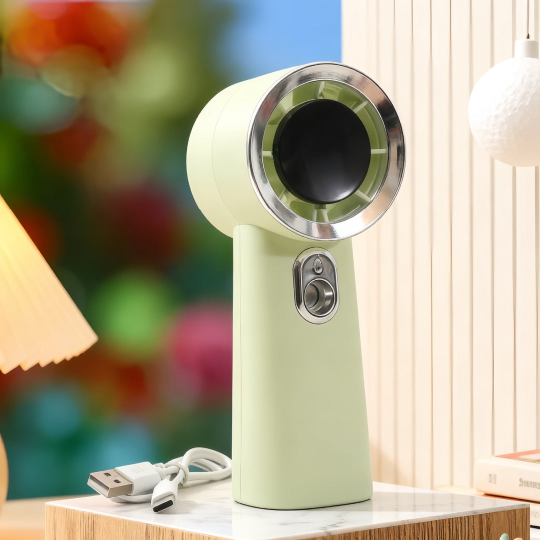 Dame bærbar mini sprayvifte med ergonomisk design Skanto