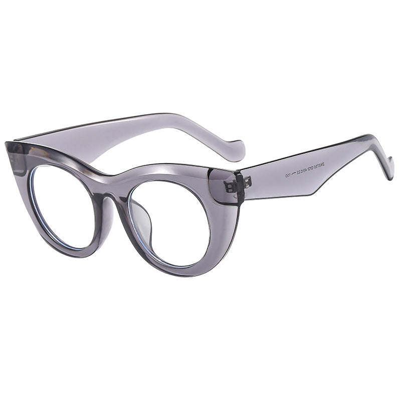 Dame Cat-Eye solbriller med transparent ramme og polariserte linser Skanto