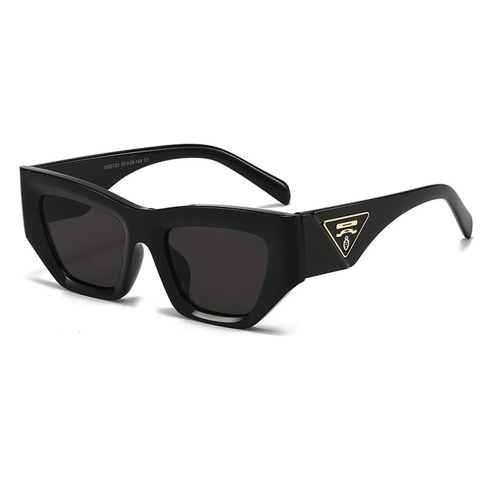 Dame Designer solbrille med moderne, geometrisk ramme Skanto