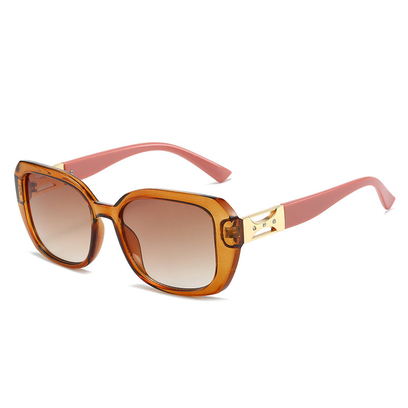 Dame Designer-solbrille med luksuriøst aksentuert ramme Skanto
