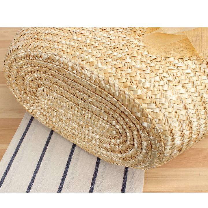 Elegant straw bag with floral accents Skanto