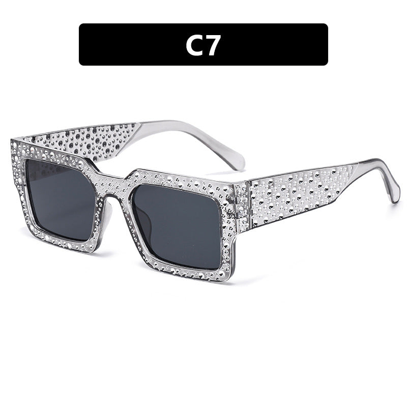 Dame ekstravagant solbrille med glitrende aksent Skanto