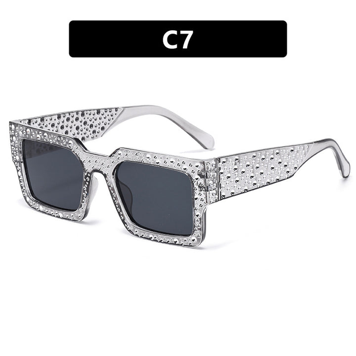 Dame ekstravagant solbrille med glitrende aksent Skanto