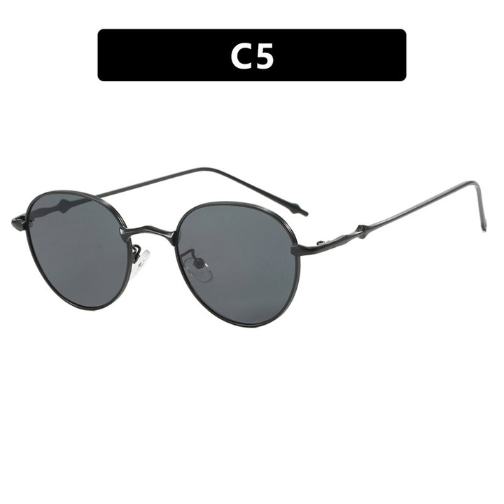Dame elegant solbrille i moderne oval design Skanto