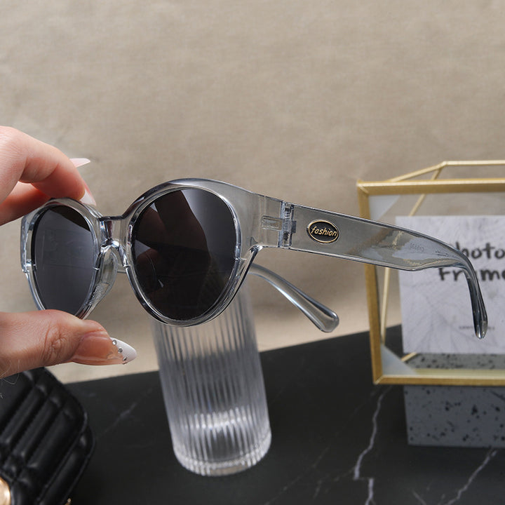 Dame Cat-Eye solbriller med eksotisk design og robust ramme Skanto