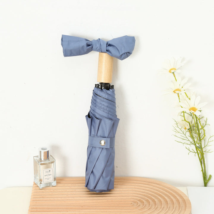 Damen Eleganter Falt-Regenschirm mit Holzgriff Skanto