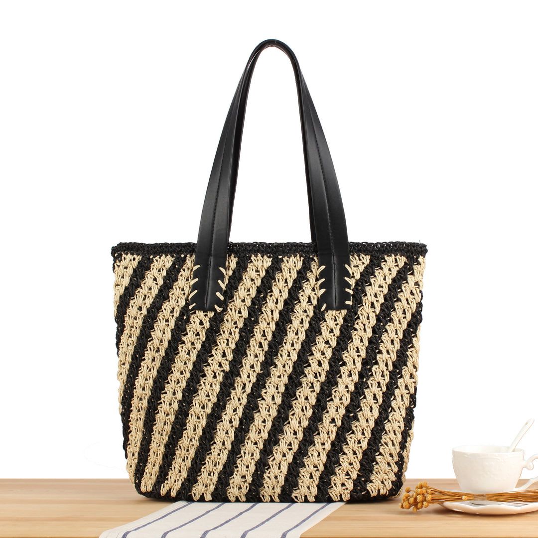 Tote bag with modern stripe pattern made of woven natural material Skanto