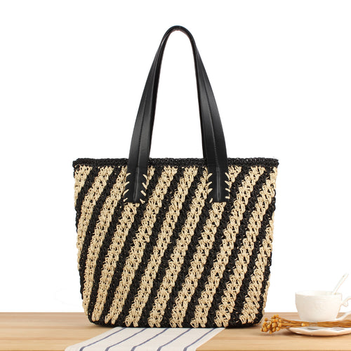 Tote bag with modern stripe pattern made of woven natural material Skanto