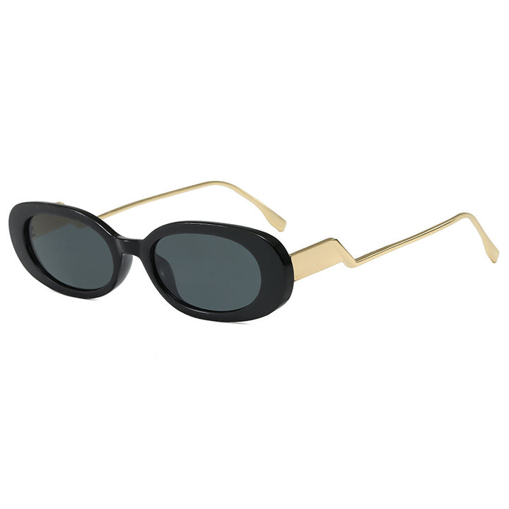 Dame retro-inspirert solbrille med moderne design og markant ramme Skanto