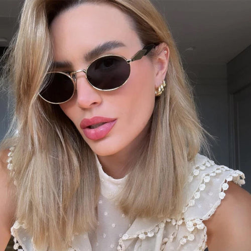 Dame designer solbrille med høyverdig rund ramme og beskyttende UV-filter Skanto