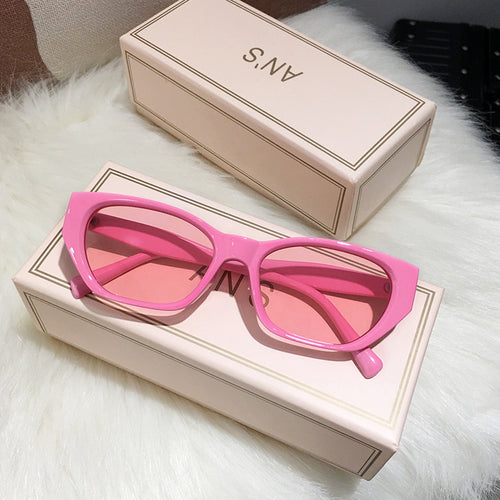 Dame Cat-Eye solbriller med transparent, geometrisk ramme Skanto