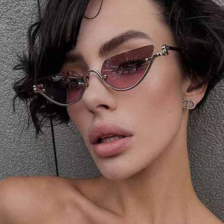Dame Cat-Eye solbriller med gullfarget metallramme og UV-beskyttelse Skanto