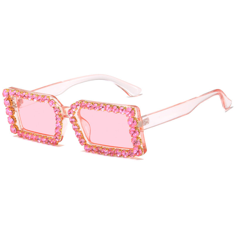 Dame moteriktig solbrille med glitrende rammedekorasjon Skanto