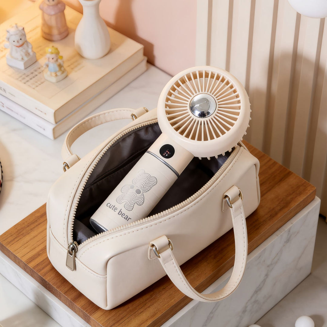 Portable Handheld Fan with Digital Temperature Display and Comfortable Design Skanto