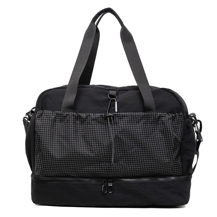 Romslig treningsveske med avtakbare bærestropper Skanto