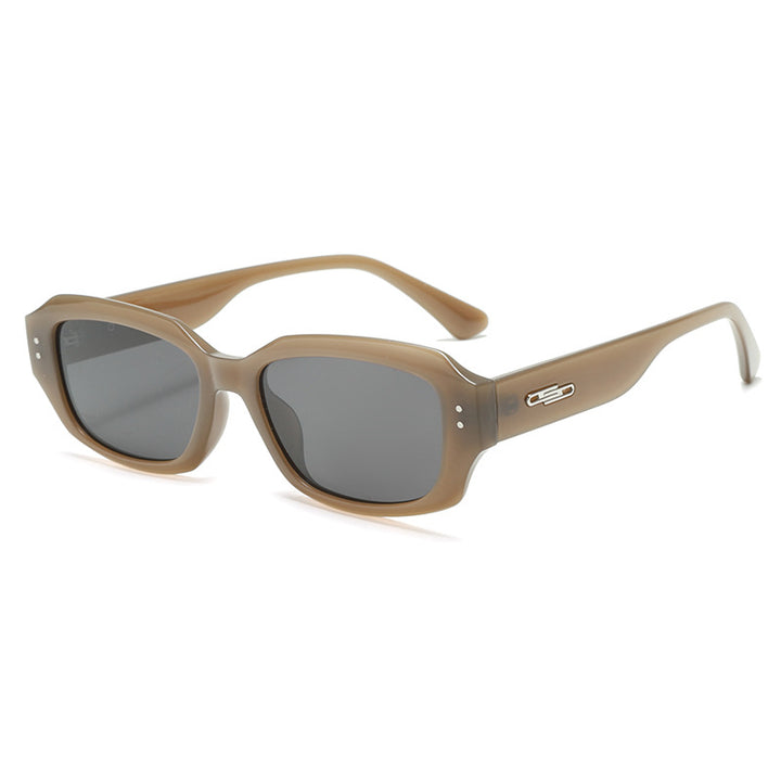 Dame trendy firkantet solbrille med innovativ gjennomsiktig ramme Skanto