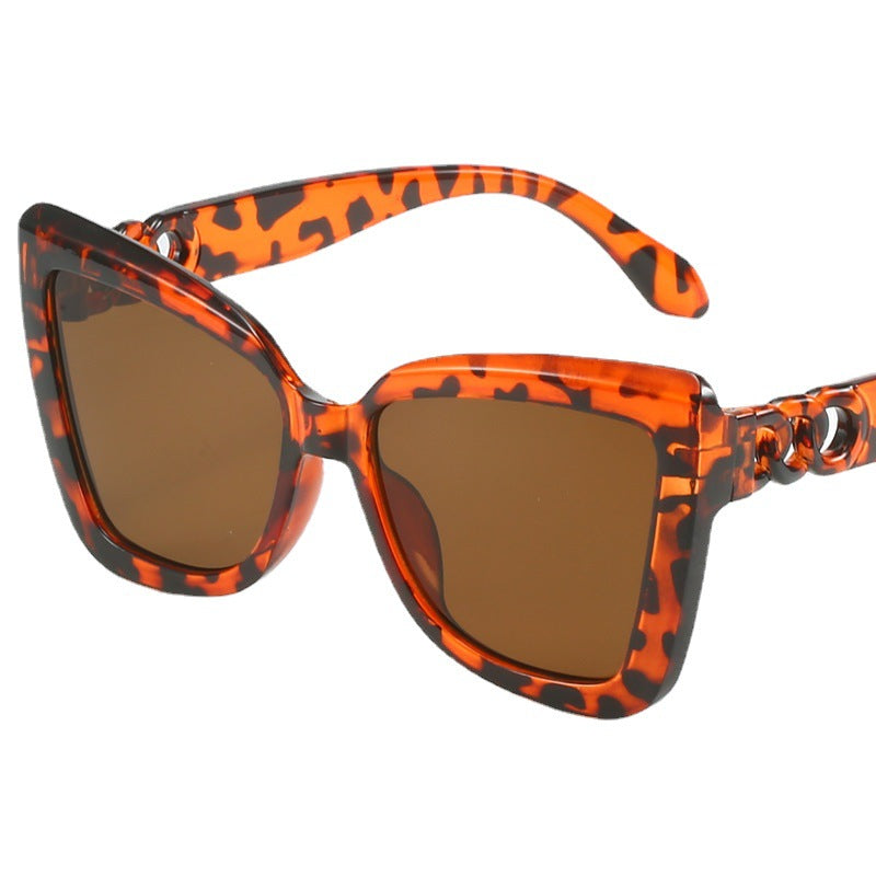 Dame moderne Cat-Eye solbriller med klar ramme og UV-beskyttelse Skanto