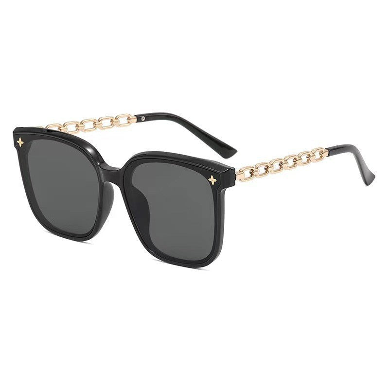 Dame Designer-solbrille med elegante lenker Skanto