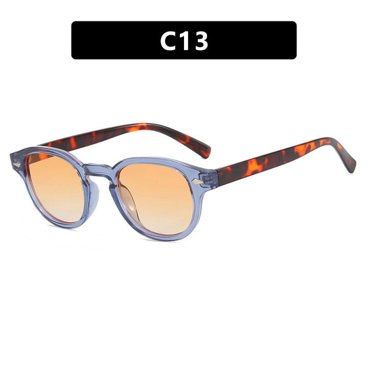Dame rund solbrille med elegant design og UV-beskyttelse Skanto